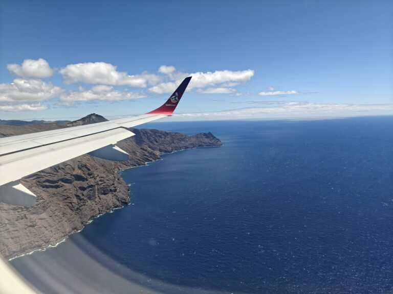 Airlink wing over the cliffs of Saint Helena on the approach to land